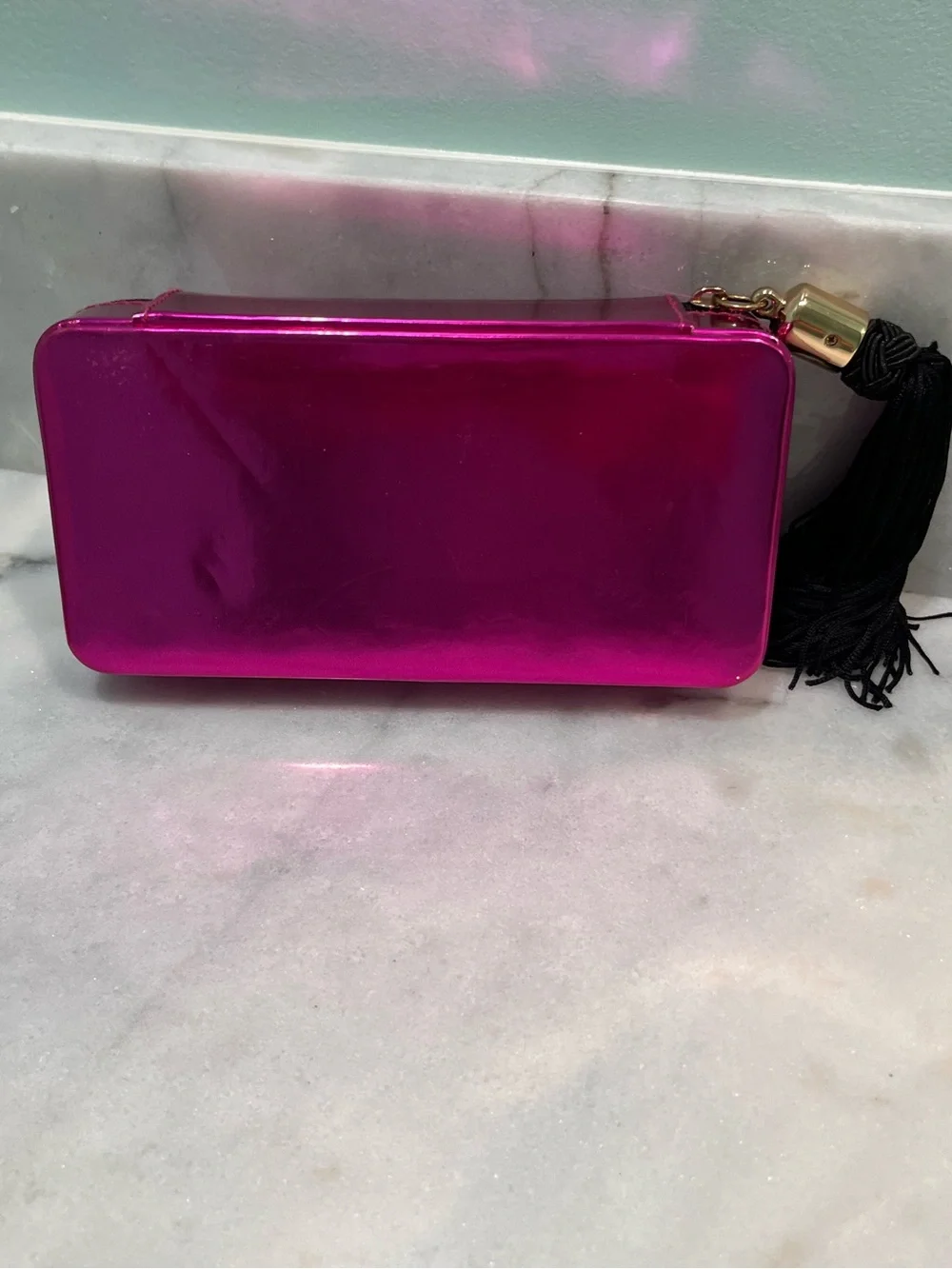 Marc Jacob’s Metallic Cosmetic Bag Fuchsia
